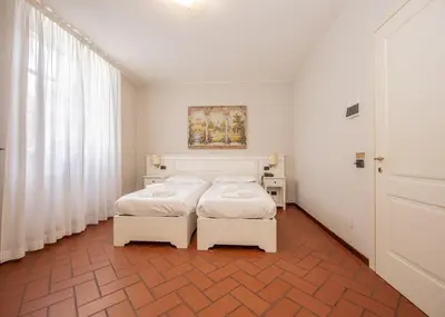 Letto o letti in una camera di HC Hotel Il Gelso Pontevico