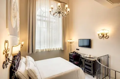 Letto o letti in una camera di Grand Hotel di Parma | UNA Esperienze
