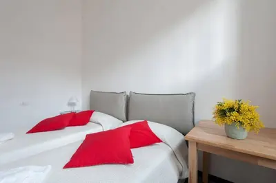 Letto o letti in una camera di Al Terra di Mare Appartamenti - 