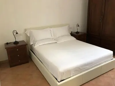 Letto o letti in una camera di B&B Giulia