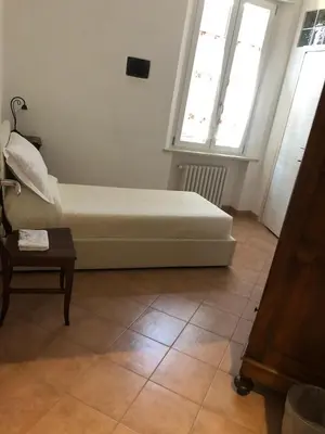 Letto o letti in una camera di B&B Giulia