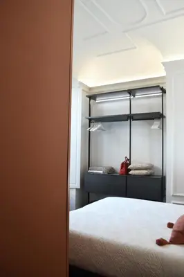 Letto o letti in una camera di PALAZZO DELLE SIRENE Deluxe Apartment & Boutique Rooms