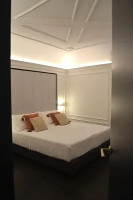Letto o letti in una camera di PALAZZO DELLE SIRENE Deluxe Apartment & Boutique Rooms