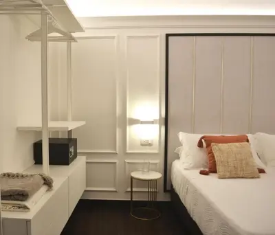 Letto o letti in una camera di PALAZZO DELLE SIRENE Deluxe Apartment & Boutique Rooms