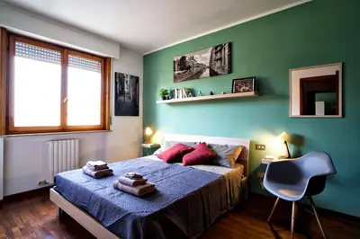 Letto o letti in una camera di Casa Zoe Apartment Free parking,self check in & free wi fi