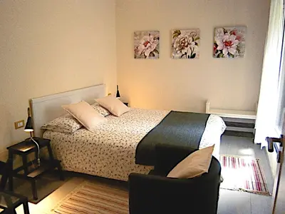 Letto o letti in una camera di Il Bosco di Campo Marzano Garden Apartments