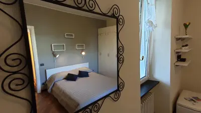 Letto o letti in una camera di Al Terra di Mare Appartamenti - 