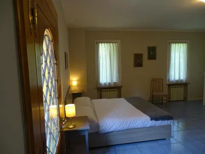 Letto o letti in una camera di Corte Isolo