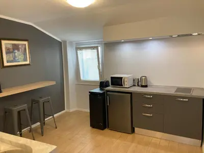 Cucina o angolo cottura di la suite di via Mazzini