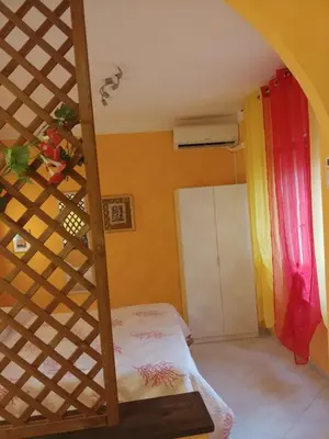 Letto o letti in una camera di Casa Elisabetta