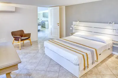 Letto o letti in una camera di GIARDINO SUL MARE House - Levanto Sea View