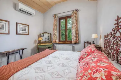 Letto o letti in una camera di Agriturismo Frecciarossa
