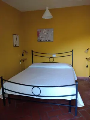 Letto o letti in una camera di Appartamento il Giglio