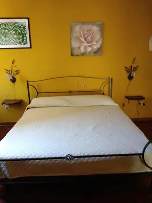 Letto o letti in una camera di Appartamento Rosa