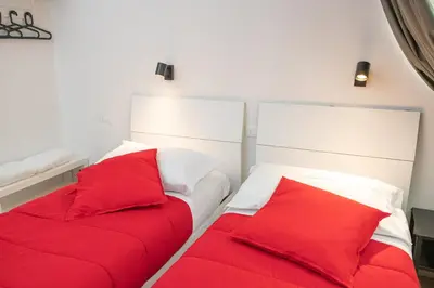 Letto o letti in una camera di 069 - Casa TRAMONTO, in CENTRO, 450metri da Mare Spiaggia