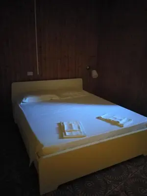 Letto o letti in una camera di Appartamento Fiordaliso