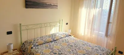 Letto o letti in una camera di Casa Sofia