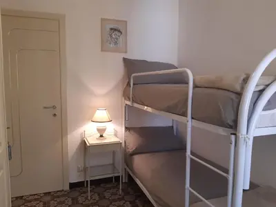 Letto o letti in una camera di House La Baia delle Favole by Holiday World