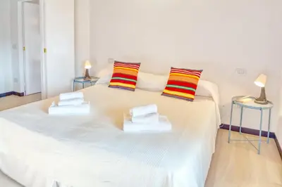 Letto o letti in una camera di il Frantoio del Mesco - Levanto