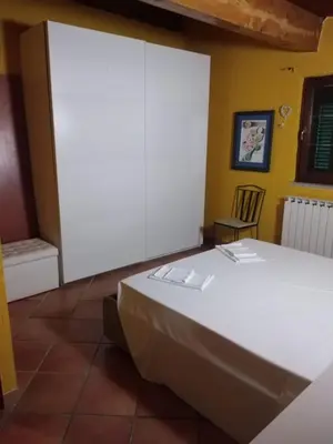 Letto o letti in una camera di Appartamento Azalea