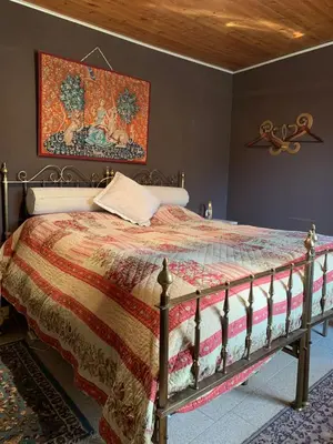 Letto o letti in una camera di La baia dei lupi