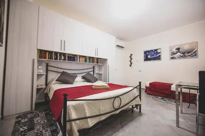 Letto o letti in una camera di ART & BOOKS bed and breakfast
