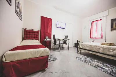 Letto o letti in una camera di ART & BOOKS bed and breakfast
