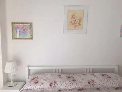 Letto o letti in una camera di La Vie En Rose