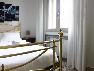 Letto o letti in una camera di Vista sul Tridente