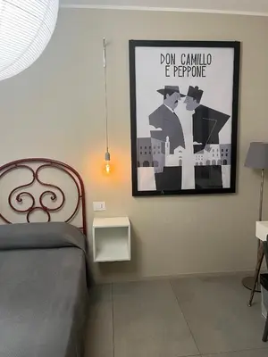 Letto o letti in una camera di La Casa all'ombra della Chiesa