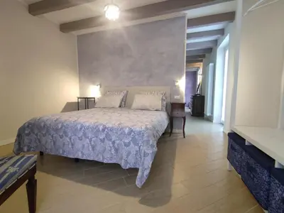 Letto o letti in una camera di La Pergola