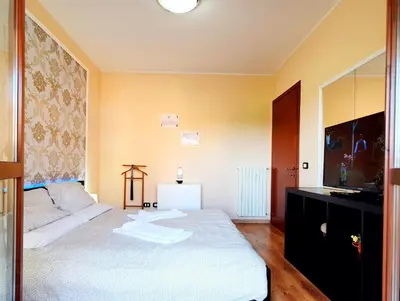 Letto o letti in una camera di GUEST HOLIDAY GRAMSCI