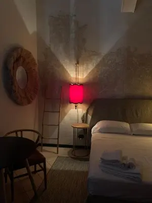 Letto o letti in una camera di Mood-Garibaldi