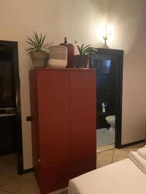 Letto o letti in una camera di Mood-Garibaldi