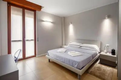 Letto o letti in una camera di Golgi Suite