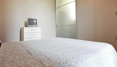 Letto o letti in una camera di The Diamond Flat