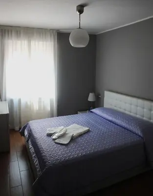 Letto o letti in una camera di Casa Jomi b&b Borghetto Lodigiano
