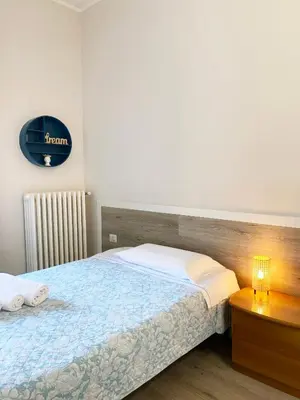 Letto o letti in una camera di EASYROOMS ONE