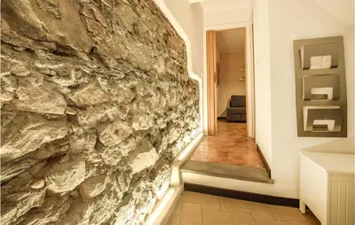 Letto o letti in una camera di Cozy Apartment In Moneglia With Kitchen