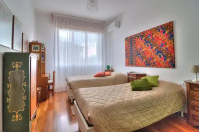 Letto o letti in una camera di La Casa di Nilde