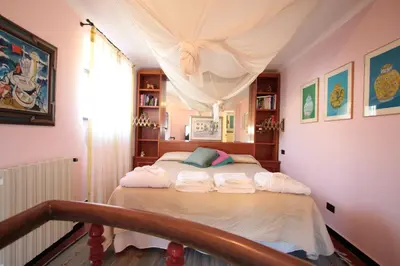 Letto o letti in una camera di Villa La Pietra - Luxury location in Levanto, 5 Terre