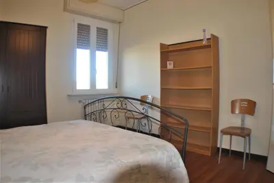 Letto o letti in una camera di Lombardi Fleming