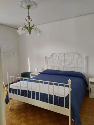 Letto o letti in una camera di Casa Iris