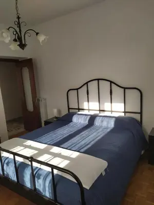 Letto o letti in una camera di Casa Iris