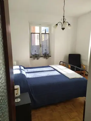 Letto o letti in una camera di Casa Iris