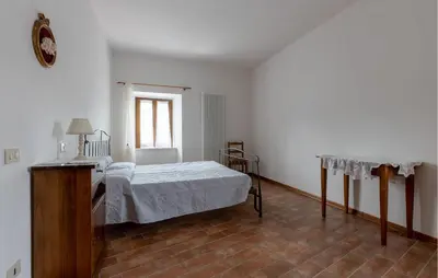Letto o letti in una camera di Cozy Home In Nicciano