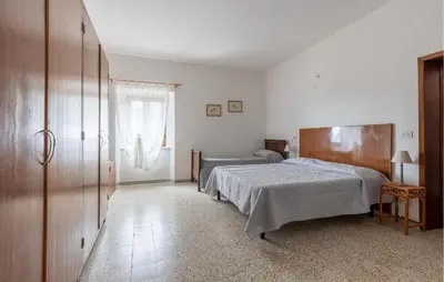 Letto o letti in una camera di Cozy Home In Nicciano