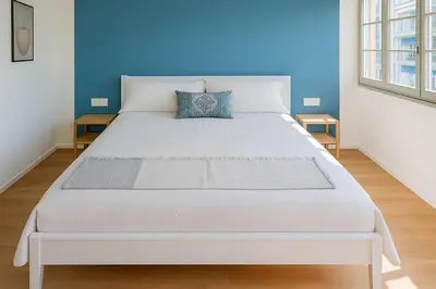 Letto o letti in una camera di Grand Hotel Torre Fara