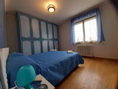 Letto o letti in una camera di La Casa di MAX- Apartment for families