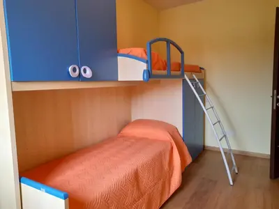 Letto o letti in una camera di La Casa di MAX- Apartment for families